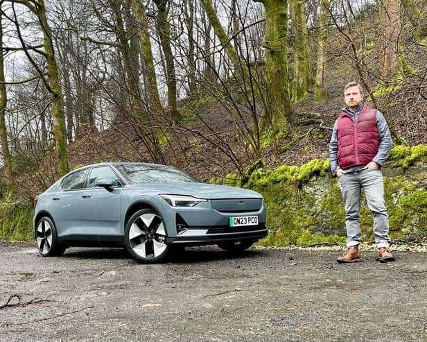 Steven Chisholm with his Polestar 2 test car near Bridge of Weir. Credit National World