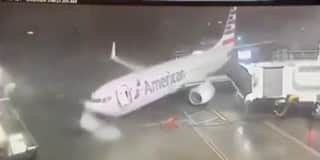 Plane blown away from airport gate by ferocious 80mph winds.