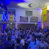 Scotland fans take in the party at an old post office in Munich.