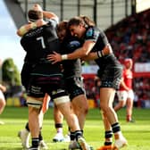 Glasgow Warriors' Sebastian Cancelliere celebrates after scoring his side's second try with Rory Darge and George Horne.