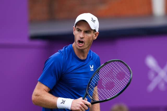 Andy Murray celebrates during his match against Alexei Popyrin at Queen's Club.