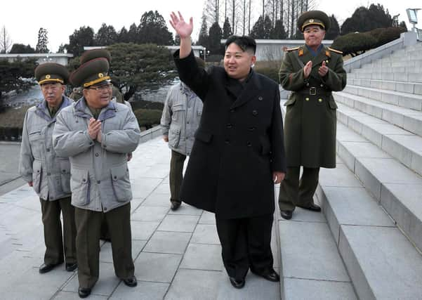 Visiting Mangyongdae Revolutionary School, Kim JongUn greeted pupils warmly. Pic: AFP