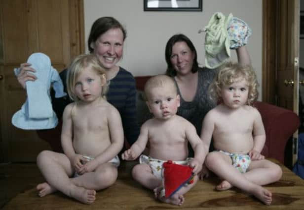 Jo Nickson with Nathaniel and Holly and Emily Wood with Maisie. Picture: Toby Williams