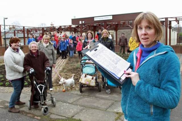 Naomi Knight and fellow residents at the library. Picture: Gordon Fraser