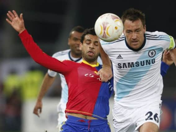 Chelsea defender John Terry holds off Mohamed Salah in last nights Europa League clash. Picture: Reuters