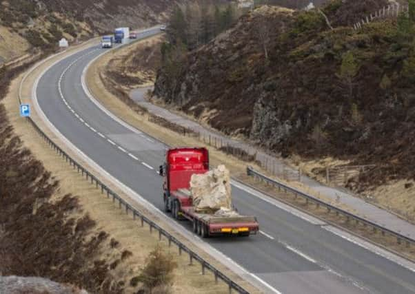 The stone sculpture is driven by the Slochd Summit on the A9