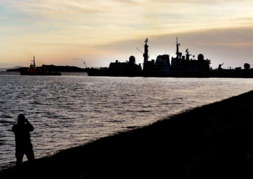 HMS Edinburgh arrives at Leith Docks yesterday. Picture: TSPL/Neil Hanna