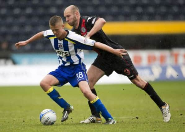 Kilmarnock's Mark O'Haraholds off Sam Parkin. Picture: SNS