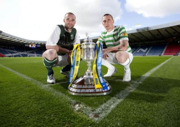 Hibernian captain James McPake and Celtic captain Scott Brown. Picture: SNS