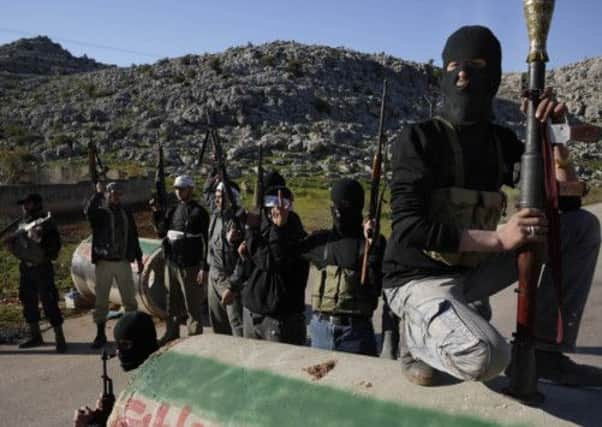 Syrian rebels in Idlib, near where the man was killed. Observers have suggested he was working with the rebels. Picture: AFP