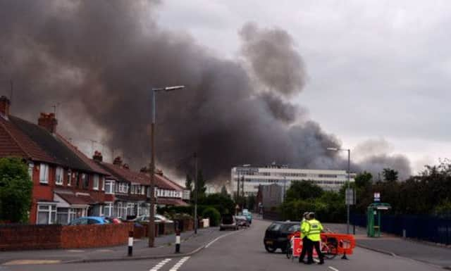 Smoke billows from the site, 12 hours after the fire started. Picture: Getty