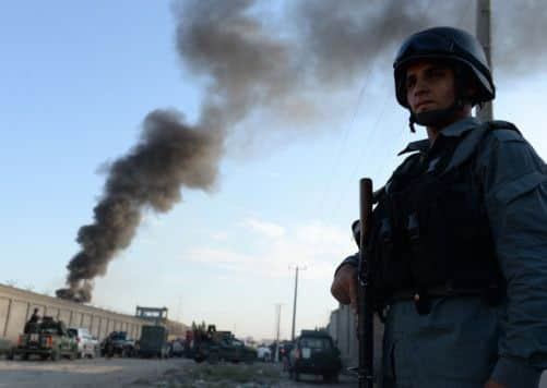 A policeman stands guard near the site of the attack. Picture: Getty