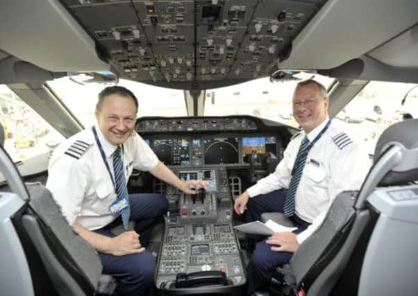 Captain Stuart Gruber and First Officer Daniel McGookin prepare for takeoff. Picture: Andy Buchanan