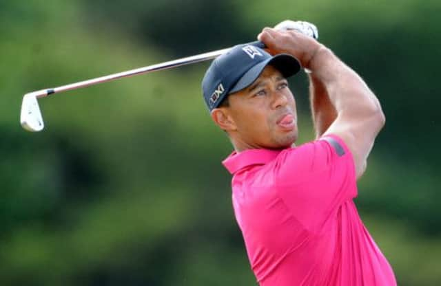 Tiger Woods practices at Muirfield, where hopes to bring to an end a winless streak of 20 majors. Picture: Jane Barlow