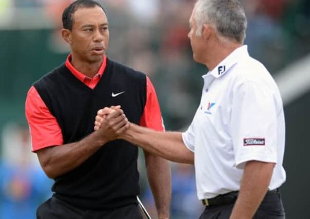 Tiger Woods and former caddie Steve Williams after the final round of the Open when the American was paired with Williams new employer Adam Scott. Picture: Ian Rutherford