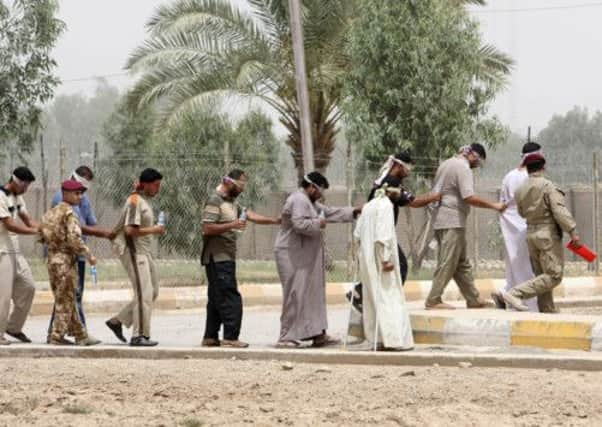 Al-Qaeda suspects at Abu Ghraib in May 2010. Picture: AP