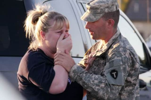 A mother awaits news of her son in the wake of the 2009 massacre. Picture: AP