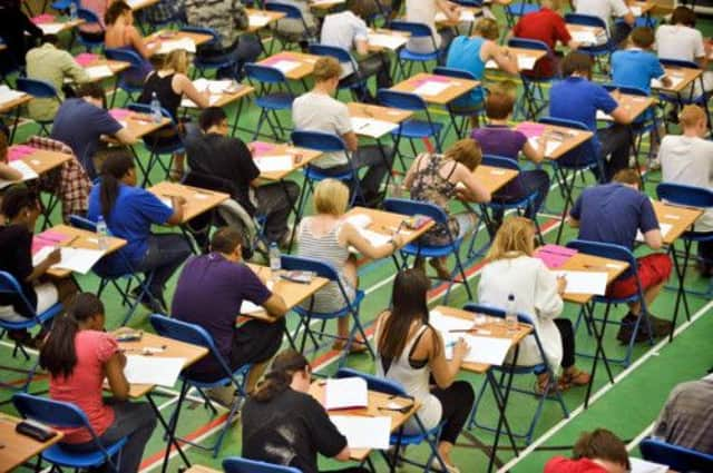 Pupils managed a record high pass rate of 98.9 per cent for Standard Grades. Picture: PA