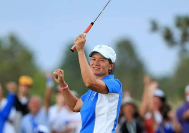 Scotlands Catriona Matthew celebrates holing the winning putt for Europe on Sunday. Picture: Getty