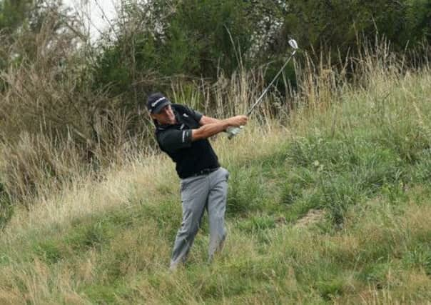 Paul McGinley plays from the Gleneagles rough during the Johnnie Walker Championship last week. Picture: Getty