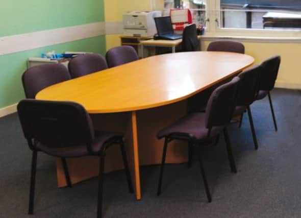 The oval table where hearings take place. Picture: Robert Perry