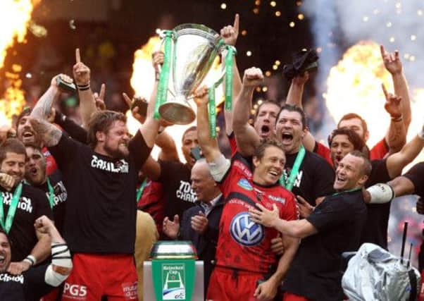 Jonny Wilkinson and Joe van Niekerk of Toulon raise the Heineken Cup after the 2013 final. Picture: Getty