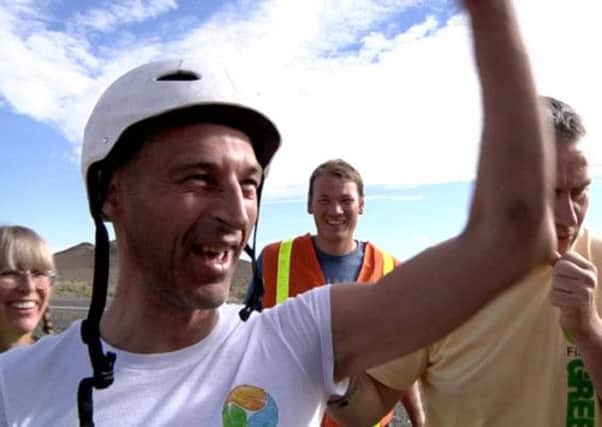 Graeme Obree celebrates setting the land speed record for prone style racing. Picture: Getty