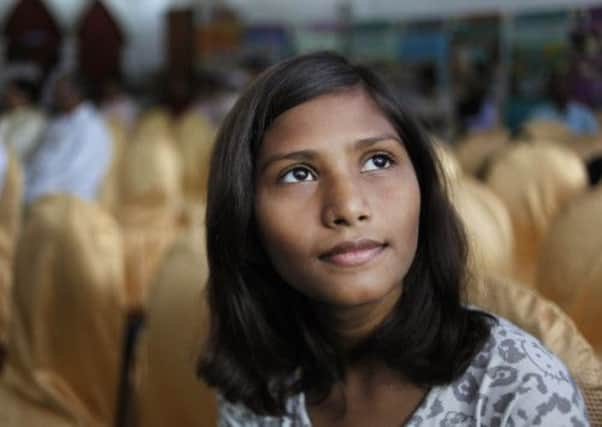 Sushma Verma has just enrolled in a master's degree in microbiology. Picture: AP