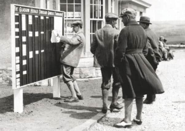 Spectators check the scoreboard at the first ever 'transatlantic tussle' in 1921. Picture: Complimentary