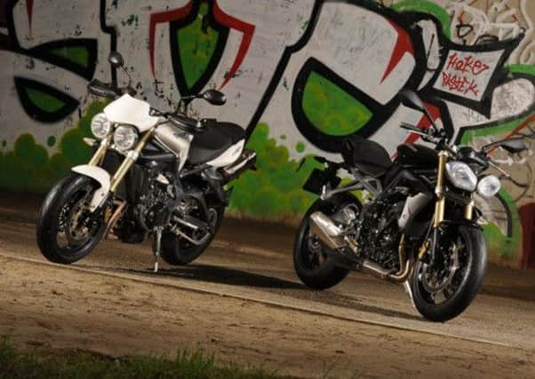 Changes to 2013's Triumph Street Triple, right, are subtle but effective changes