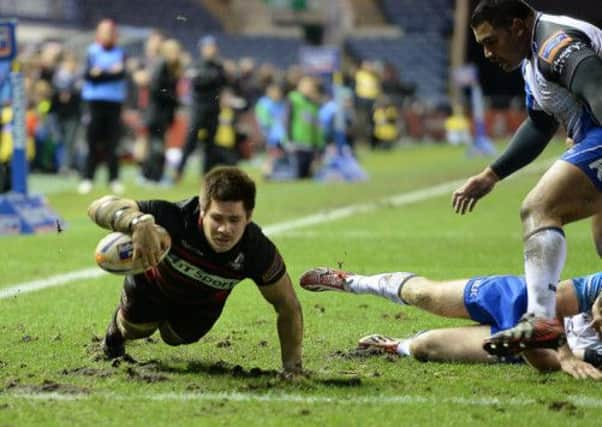 Cornell du Preez (left) scores a try for Edinburgh. Picture: SNS