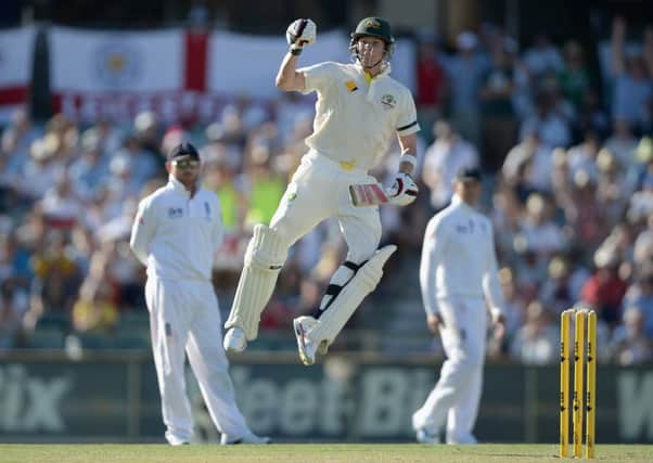 Australias Steve Smith gets airborne after reaching his hundred on day one at the Waca. Picture: Getty