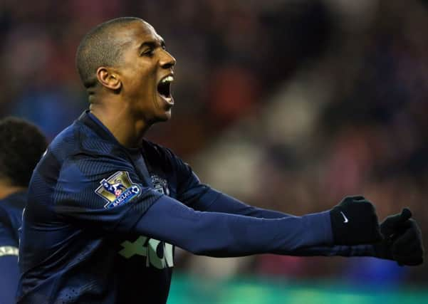 Elation is written across Ashley Youngs face as Patrice Evra scores the Reds second. Picture: PA