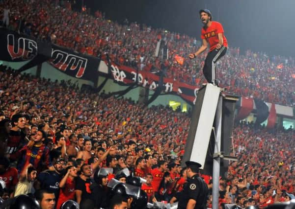 High emotion: Mahmoud Hassan made his debut in the frenzied atmosphere of a Cairo derby so is unlikely to be fazed by joining one of the Old Firm. Picture: Getty