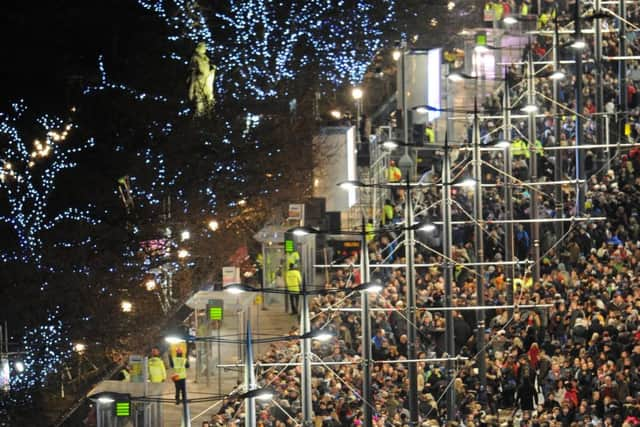 Tourists at Edinburgh's Hogmanay celebrations. Picture: Jane Barlow