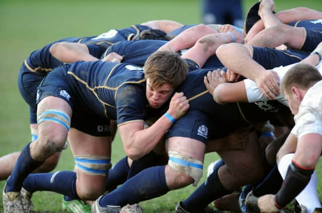 Flanker Tommy Spinks in action against England at youth level. Picture: PA