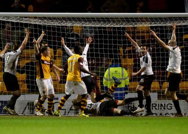 Russell Anderson (#4) levels the score late on. Picture: SNS