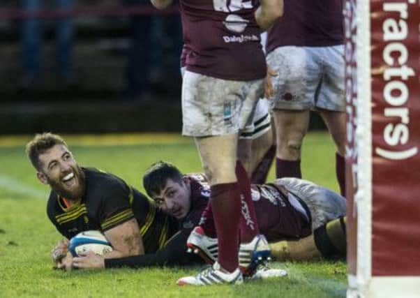 Perry Parker shows his delight as he scores the try that put Melrose ahead. Picture: Ian Georgeson