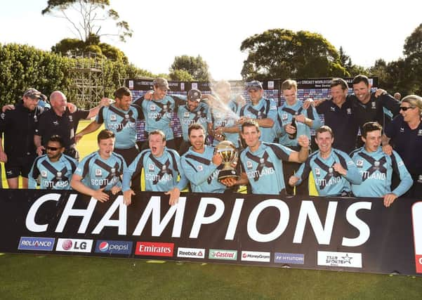 The Scotland team celebrate after their win over UAE in the final of the World Cup qualifying tournament. Photograph: Martin Hunter/Getty