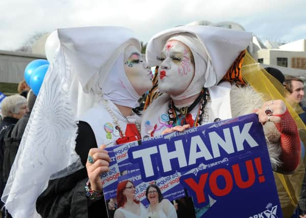 Equal Marriage supporters gathered outside Holyrood. Picture: Neil Hanna