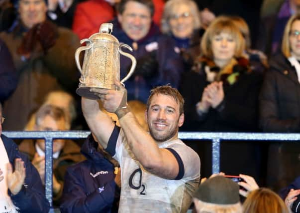 Chris Robshaw, the England captain, raises the Calcutta Cup at Murrayfield. Picture: Getty