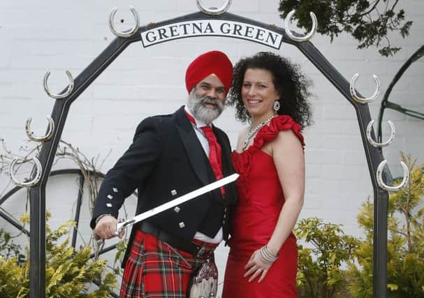 Amerjit and Sarah Walia tie the knot at Gretna Green. Picture: Getty