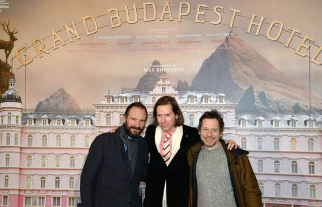 Ralph Fiennes and Mathieu Amalric with Wes Anderson in Paris last night. Picture: Getty