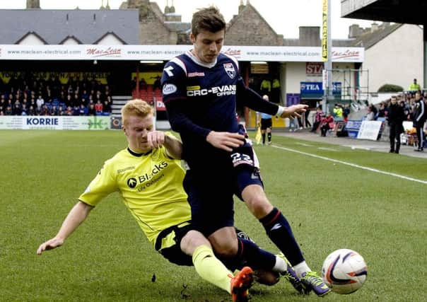 St Mirren's Conor Newton (left) challenges Graham Carey. Picture: SNS