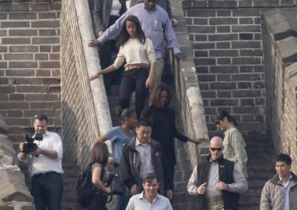 Michelle Obama and daughter Malia visit the Great Wall at Mutianyu. Picture: Getty