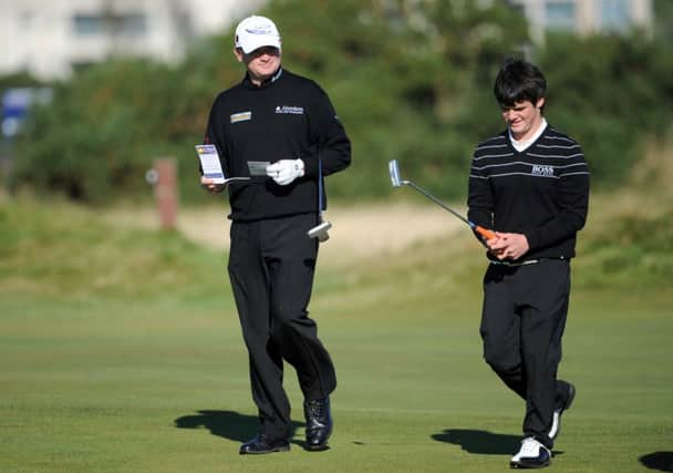 Paul Lawrie playing with son Craig Lawrie. Picture: Jane Barlow