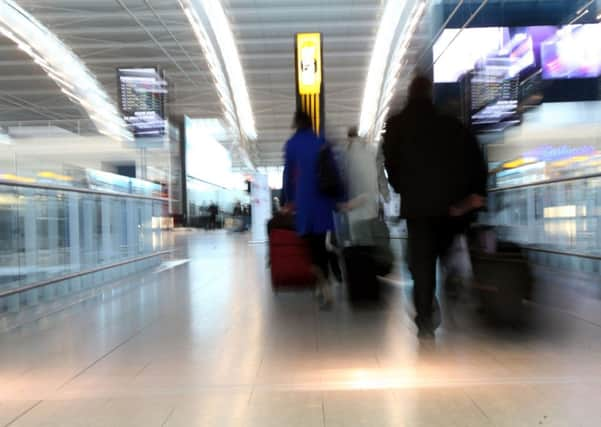 Passengers at Heathrow Airport, where the Court heard the spending spree took place. Picture: PA