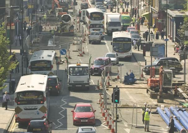 Much of the necessary preparatory work for the trams has already been carried out on Leith Walk. Picture: Ian Georgeson