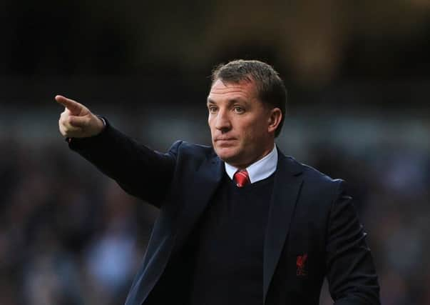 Brendan Rodgers Liverpool have the momentum in the title race after ten consecutive wins. Picture: PA