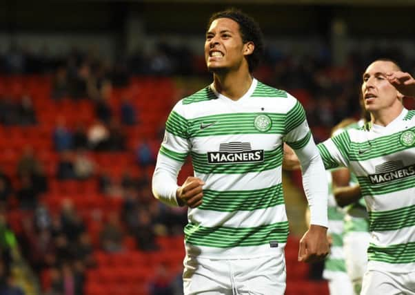 Virgil van Dijk celebrates scoring for Celtic. Picture: SNS